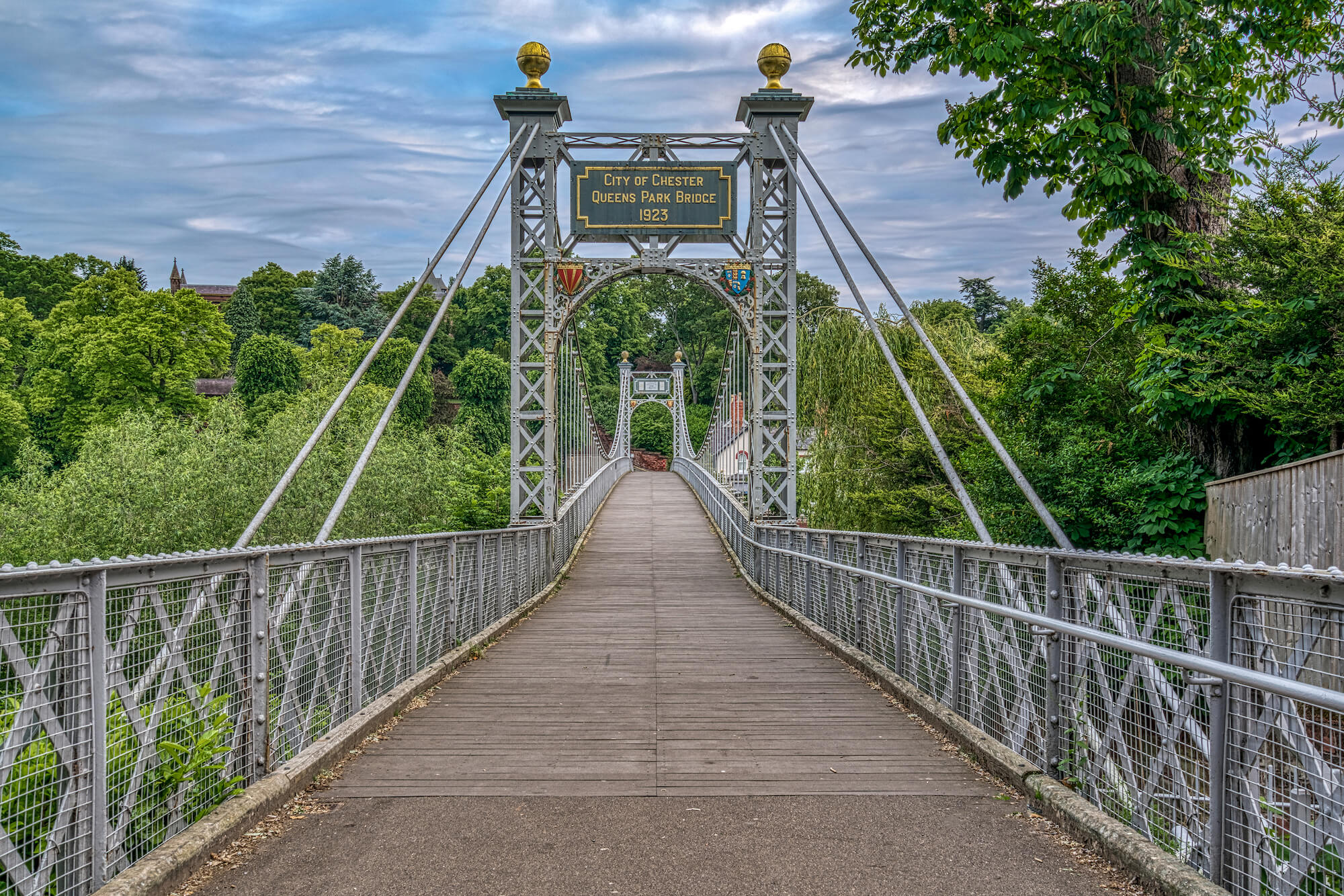 An image picturing an iconic bridge crossing over the River Dee in the heart of the historic city of Chester taken by local independant Chester and Cheshire property experts, Currans Homes Estate Agents.